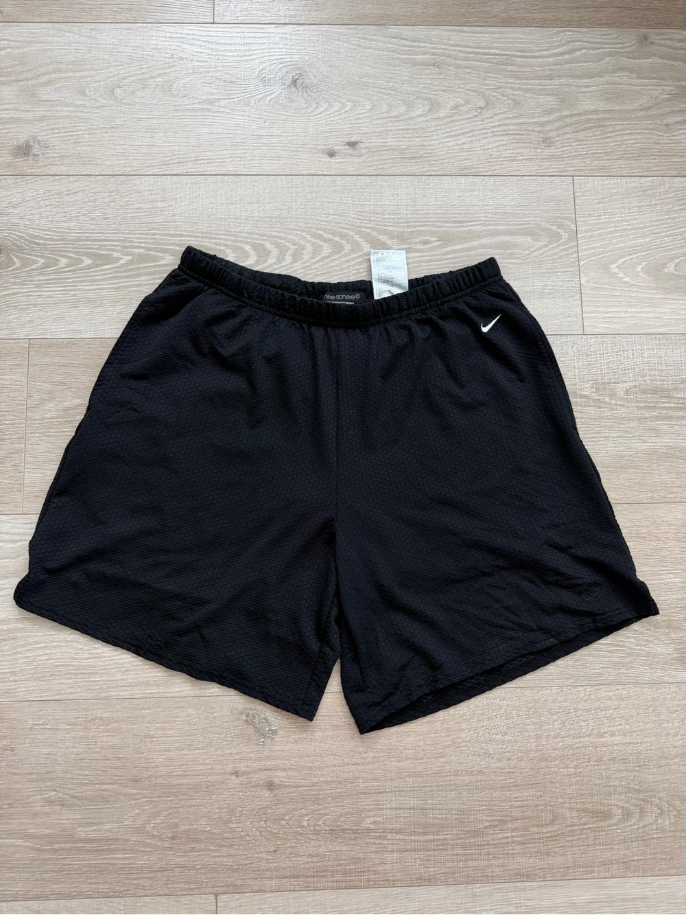 Nike Sphere Black Athletic Shorts with White Swoosh